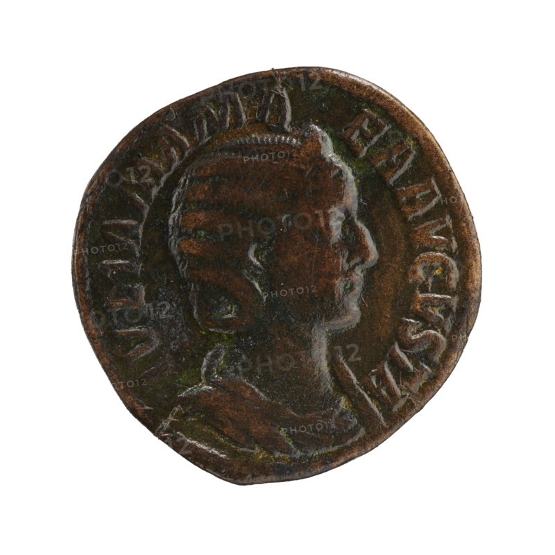 Sestertius of Julia Mamaea ca. 180–235 issued under Alexander Severus 208–235; Roman emperor 222–235, c. 225–235. Obverse: portrait of Julia Mamaea; reverse: personification Felicitas. Roman Empire; Rome. Bronze coin; diameter 28.5–29.0 mm; weight 20.7 g., A round metal coin with a raised profile of a person facing right, showing facial features and hair styled back; the coin surface is worn with areas of darker and lighter brown, patches of greenish oxidation, and subtle highlights; a raised rim encircles the portrait and there are traces of raised decorative elements around the edge.
