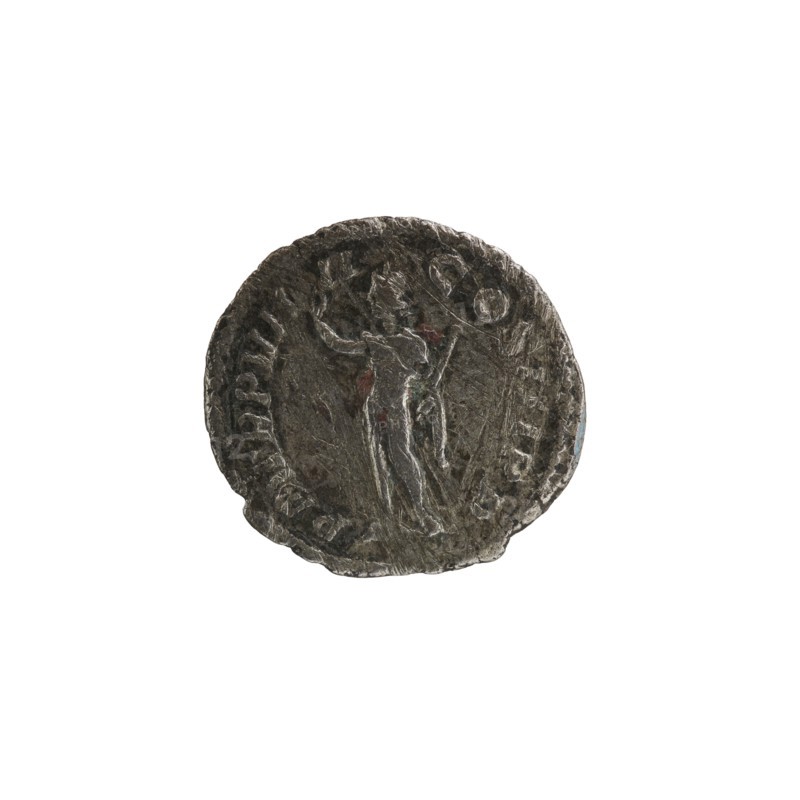 Denarius; Roman deities; Sol; Alexander Severus Roman emperor, 222–235 — iconography; dated 230; Roman Empire 27 BC–476, Rome mint; coin; diameter 18.0–19.5 mm; weight 1.85 g, A round, worn coin with a rough, textured surface showing a raised, narrow-relief figure of a standing person in the center; the figure appears elongated with one arm raised and the other lowered. The coin shows uneven edges and shallow grooves around the perimeter suggesting an embossed border. The visible colors are dark gray with lighter gray highlights and subtle hints of brownish or reddish discoloration in spots, and a faint bluish tint near the rim.