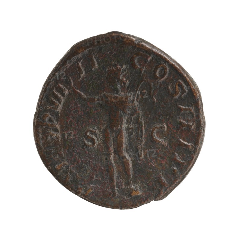 Sestertius; subject: Sol mythology and Roman deities; portrait/issue of Alexander Severus Roman emperor, ruled 222–235 — iconography; date: 230; place: Roman Empire 27 BC–476, Rome; object type: coin; material: coin; diameter 28.0–29.0 mm; weight 16.97 g., A round, worn metal object with a dark brown and greenish patina showing irregular reddish and black spots, featuring the lightly raised, weathered outline of a standing human figure at its center and a few faint raised marks around the edge, against a plain white background.