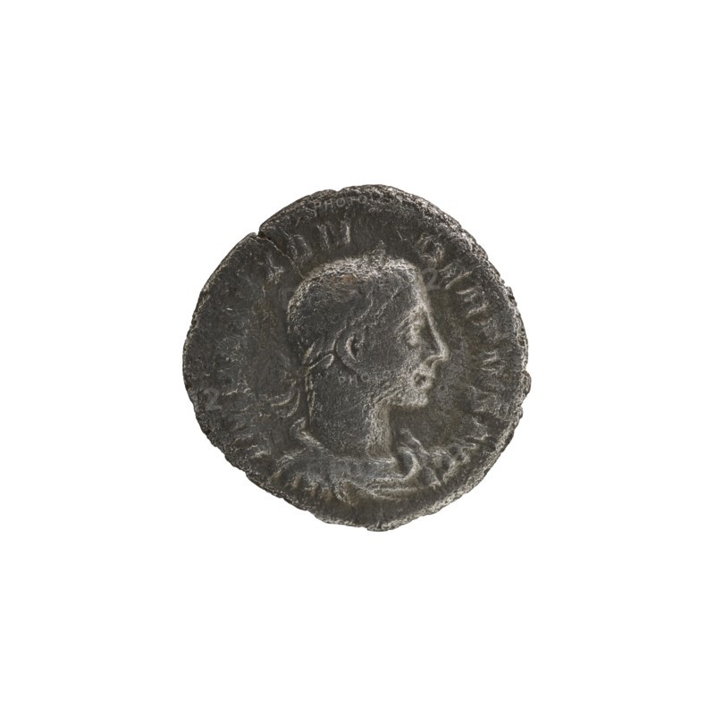 Denarius; Roman deities; Sol; Alexander Severus Roman emperor, 222–235 — iconography; dated 231; Roman Empire 27 BC–476, Rome; coin; diameter 18.5–19.0 mm; weight 2.27 g, A round, worn coin with a raised profile of a person's head facing right, showing short hair and a defined nose and chin; the coin surface appears textured and uneven with a slightly rough edge. The visible colors are dark gray, black, and lighter gray highlights.