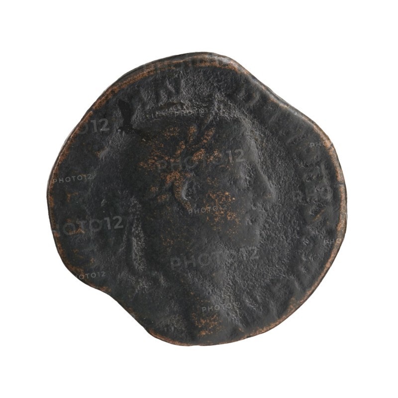 Sestertius coin depicting Sol mythology; obverse associated with Alexander Severus Roman emperor, 222–235; iconography of Roman deities; dated 231; Roman Empire 27 BC–476; mint: Rome; coin; diameter 27.0–29.0 mm; weight 15.12 g, A round, worn coin-like object with an uneven edge, primarily dark gray to black in color with a patina of brownish-orange spots and highlights, showing a faint raised profile of a human head in the center and subtle textured surface variations across the face, set against a white background.
