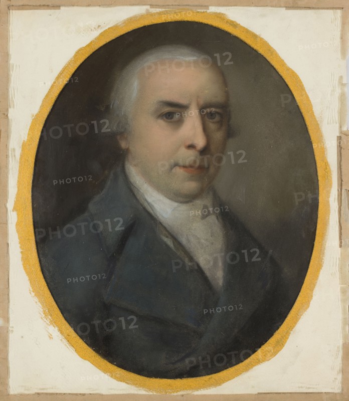 Portrait of August Joseph Pechwell; artists: Antoni Jan Blank 1785–1844 and Jan Krystian Gladysz ca. 1762–1830; unknown pastelist; medium: pastel drawing; subject: bust portrait of painter and engraver August Joseph Pechwell 1757–1811; style: Polish pastels; dated circa 1800–1811; themes: male portrait, portrait of an artist; related professions: painters, engravers, museologists; place associations: Dresden, Saxony, Germany; inscription/provenance note: purchase., An oval portrait of a person shown from the chest up, with pale skin and light gray hair, wearing a dark blue coat and a light-colored cravat; the face has neutral expression with visible eyes, nose, and mouth. The background inside the oval is a muted grayish brown, and the oval is bordered by a rough golden yellow rim. Around the oval is a wider off-white area with beige and light tan edging and some darker brown tape-like patches at the outer margins. The visible colors include pale skin tones, light gray, dark blue, gray...