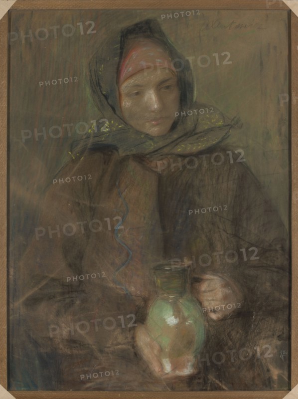 Hutsul woman with a jug, Teodor Axentowicz 1859–1938, painter; Young Poland; Polish; Hutsul; pastel drawing, before 1907; height 81 cm, width 60.5 cm; jugs; ethnography; inscription/labels and provenance noted; Leon Ildefons Papieski 1859–1917 mentioned., A seated figure wearing a dark hooded headscarf layered over a reddish head covering is shown holding a rounded ceramic jug; the face is pale with subtle shadows and a neutral expression, and the hands are visible around the jug. The clothing is in muted browns and dark tones with hints of blue and green accents, and there are small bright yellow decorative marks on the headscarf. The jug displays soft green and light beige areas with reflective highlights. The background is a blend of earthy greens, browns, and grayish tones, and the image is framed by a light brown wooden border.