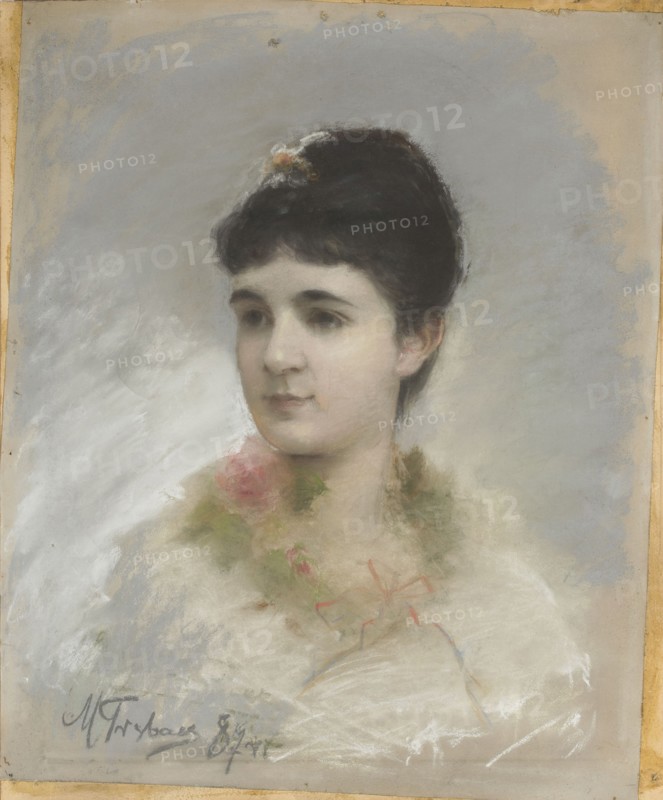Portrait of a Young Woman Female Bust, Trumpeter, Maurycy 1861–1941 painter, 1887, pastel, 56.6 × 46.3 cm; female portrait, bust; Judaica, Poland culture., A portrait of a young woman shown from the shoulders up against a soft gray background, with dark brown hair styled up and a small floral ornament in the hair, a pale complexion, dark eyebrows and eyes, and a calm neutral expression; she wears a light, fluffy white garment or wrap with a garland of pink roses and green leaves at the neckline and a faint suggestion of a colored ribbon, with overall colors including gray, white, pale skin tones, dark brown, pink, green, and subtle touches of warm beige around the edges.