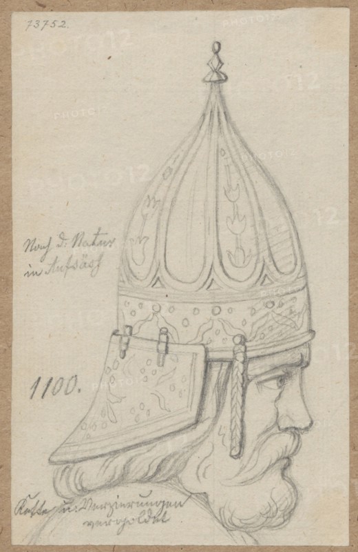 Head of a man in profile in a helmet, drawing, circa 1100; draughtsman Aleksander Lesser 1814–1884. Subject: helmets, militaria, army, armor, knights' armor; 11th century. Drawing glued with the upper edge to brown cardboard. Medium: drawing/sketch. Sheet: height 13.4 cm, width 8.5 cm; cardboard: height 34.6 cm, width 24.8 cm. Date of draughtsmanship: 1830–1884., A pencil sketch on a beige paper background shows a profile of a bearded man wearing an ornate pointed helmet with a decorative finial on top and patterned panels; the helmet has a flared neck guard and a braided strap hanging beside the ear. The man's face features a prominent nose, visible eye with a focused expression, and a full mustache and beard with flowing, curved hair lines. The drawing uses shades of gray pencil, with the paper showing light tan and off-white tones.