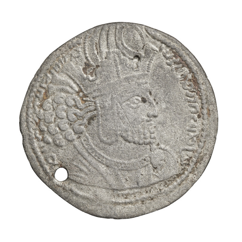 Drachma of Shapur I (ruler of Persia; 241–272). Obverse: Bust of Shapur I facing right, wearing a crown topped with a korymbos; pearl border. Pahlavi inscription (Middle Persian). Reverse: Burning altar; to the sides stand the king and the priest, each holding a spear in one hand and the other resting on the hilt of a sword; in the left field three balls forming an inverted triangle; pearl rim. Pahlavi inscription (Middle Persian). Sassanid art; Sassanid Kingdom. Coin: Persia, 241–272. Diameter 26.5 × 27.0 mm; weight 3.60 g.