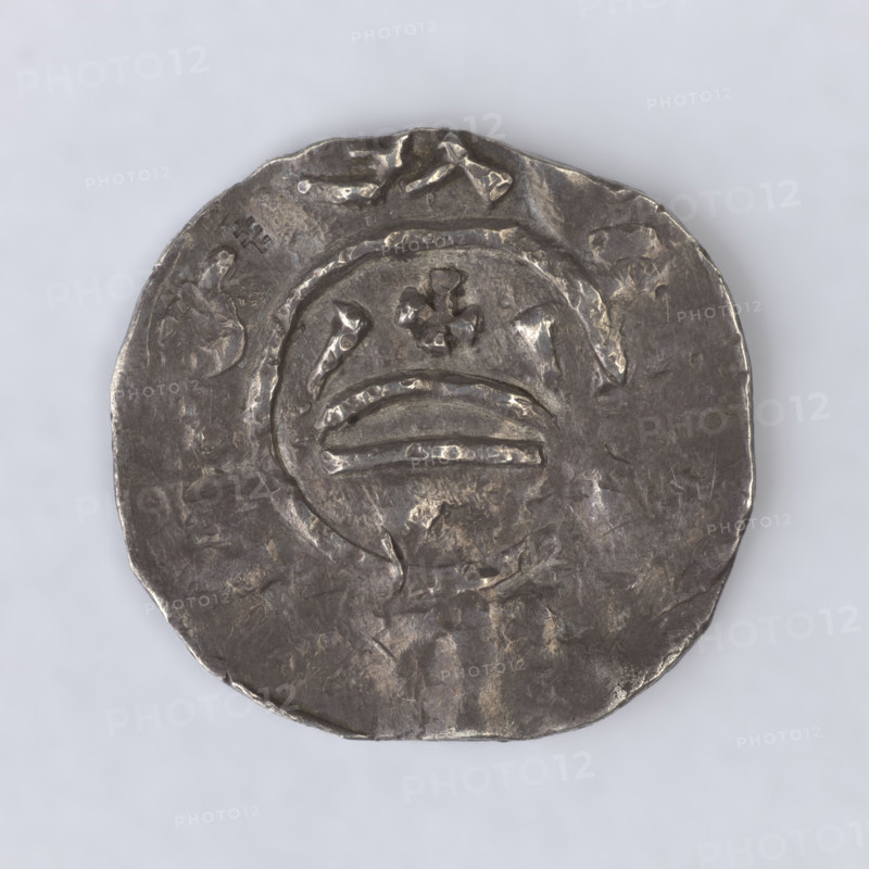 denarius, Mieszko II (King of Poland; 1025–1031; 1032–1034), medium (state of preservation). Within a continuous border a segment of a circle with side bows and a cross at the top. Rim inscription. Within a continuous border an isosceles cross with crossbars at the ends of the arms. One ball in each corner. On the rim on the extension of the arms. Date: 1013–1020. Poland, Poznan. Coin. Diameter 19.8–20.9 mm. Weight 1.97 g.
