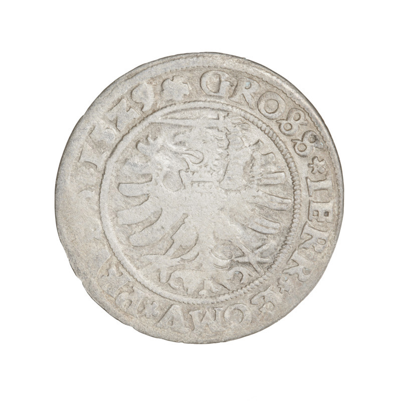 Prussian grosz, Sigismund I the Old (King of Poland; 1506–1548). Obverse: Crowned male bust in profile turned to the right; in the rim between pearly borders an inscription: .SIGIS.I.RE, .DO.TOCI.PRVSS. Reverse: The Eagle of Royal Prussia; in the rim between the pearl borders the inscription: .GROSS.TERR., OMV.PR, .15Z9. Date: 1529. Torun, Poland. Material: coin. Subjects/themes: Jagiellonians (dynasty), coats of arms, Eagle (coat of arms), male/royal bust; iconography of Sigismund I the Old.
