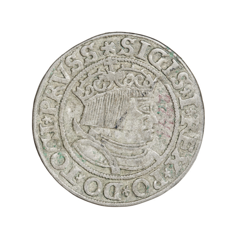 Prussian grosz, Sigismund I the Old (King of Poland; 1506–1548). Obverse: Crowned male bust in profile turned to the right; rim inscription: .SIGIS.I.REX.PO.DO.TOCI.PRVSS. Reverse: The Eagle of Royal Prussia; rim inscription: .GROSS.COMV.TERR.PRVSSIE.1534. Date: 1534, Torun, Poland. Coin; diameter 23.0–23.5 mm, weight 1.69 g.