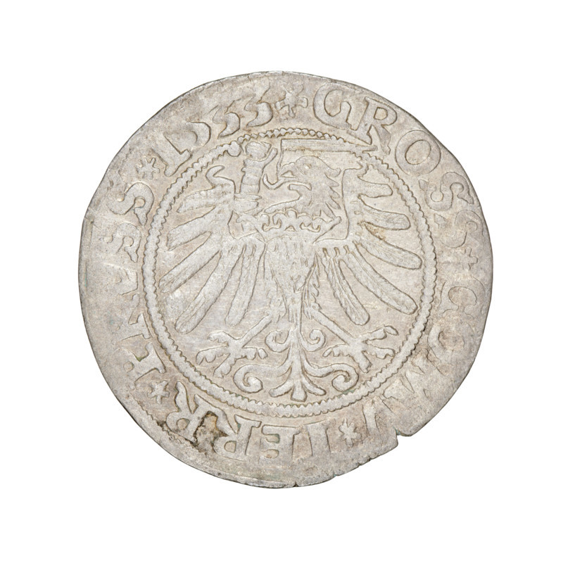Prussian grosz, Sigismund I the Old (King of Poland; 1506–1548). Obverse: Crowned male bust in profile turned to the right; in the rim between the pearl borders an inscription: .SIGIS.I.REX.PO.DO.TOCI.PRVSSI. Reverse: The Eagle of Royal Prussia; in the rim between the pearl borders the inscription: .GROSS.COMV.TERR.PRVSS.1533. Date: 1533, Torun, Poland. Coin; diameter 22.7–23.0 mm; weight 1.89 g. Subjects/ motifs: eagles, coats of arms, male/royal bust; dynasty: Jagiellonians.