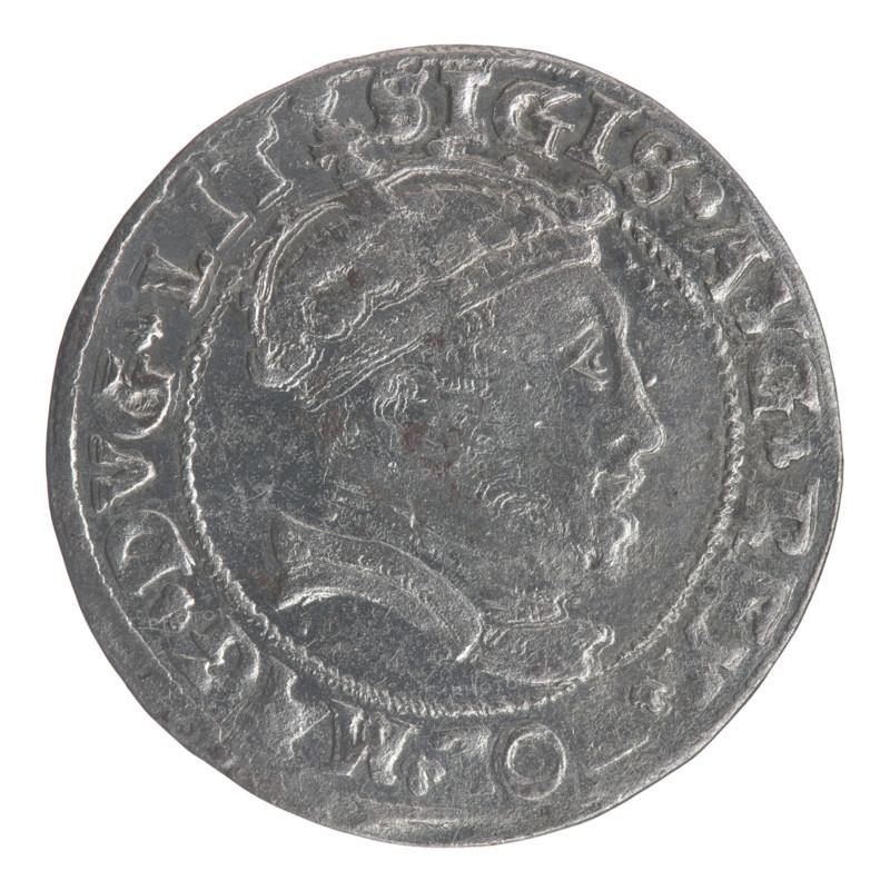Lithuanian grosz on a Lithuanian foot, Sigismund II Augustus (King of Poland; 1544–1572), coats of arms, Jagiellonians (dynasty), royal bust, Polish coins, Sigismund II Augustus (King of Poland; 1520–1572) - iconography, Columns of Gediminas (coat of arms of Lithuania), male busts, Pogon (coat of arms; Lithuania). Obverse: Crowned male bust in armour with profile turned to the right; in the rim an inscription divided at the top by a crown cross: .SIGIS.AVG.REX. O .MAG.DVC.LIT. Reverse: Lithuanian Pursuit (Pogon) facing left, below the date 1546 and the Column coat of arms dividing the inscription in the rim: MONET. GNI DVCAT9.LITVA. 1546. Coin struck in Vilnius, Grand Duchy of Lithuania. Diameter 24.8–25.0 mm; weight 2.35 g.