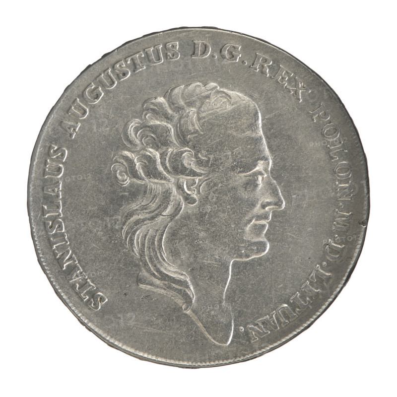 Crown thaler, Brenn, Efraim (fl. 1774–1792); Stanislaw August Poniatowski (King of Poland; 1732–1798) — obverse: head of Stanislaw August turned right, around the inscription divided at the bottom: STANISLAUS AUGUSTUS DG REX POLON. MDLITUAN.; pearl border. Reverse: under a crown, in a wreath entwined with a sash with the motto PRO FIDE - LEGE - ET - GREGE, a round five-field coat of arms with the coats of arms of Poland (Orzel), Lithuania (Pogon) and the Poniatowski coat of arms (Ciolek); below on the sash the Order of the White Eagle; on the sides the letters E. - B.; around the inscription divided twice: X EX MARCA PURA - COLONIEN. 1784.; pearl border. Inscription on the edge: FI, - PUBLICAE- PIGNU, -  . 1784. Polish–Lithuanian Commonwealth (1569–1795), Warsaw, Poland. Coin; diameter 40.0–40.2 mm; weight 27.98 g.