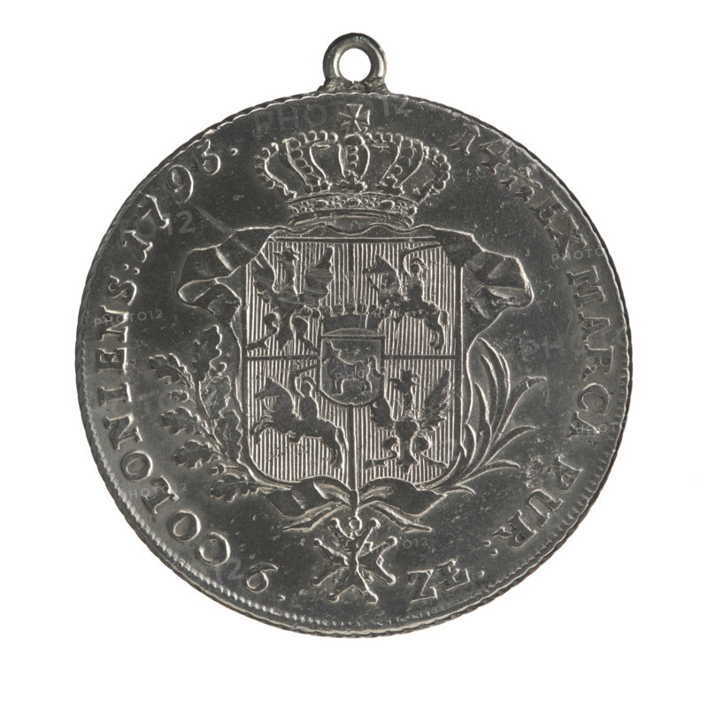 Crown thaler, Stanislaw August Poniatowski (King of Poland; 1732–1798). Coin (with lug), 1795. Obverse: Head of Stanislaw August turned to the right, around a divided inscription at the bottom: STANISLAUS AUGUSTUS D G REX POLON: M D LIT. — pearl border. Reverse: Under a crown, decorated with an oak and laurel branch, a five-field heraldic shield with the coats of arms of Poland (Eagle), Lithuania (Pogon) and the Poniatowski coat of arms (Ciolek); on the sash the Order of the White Eagle; on the sides: 6.- ZL.; around the inscription divided twice: 14 1/12 EX MARCA PUR: — COLONIENS: 1795. — pearl border. Diagonally fluted edge; lug soldered on afterwards. Polish–Lithuanian Commonwealth (1569–1795), Warsaw, Poland. Diameter 37.6 mm (38.0 mm; with lug 41.2 mm). Weight 23.98 g (with lug).