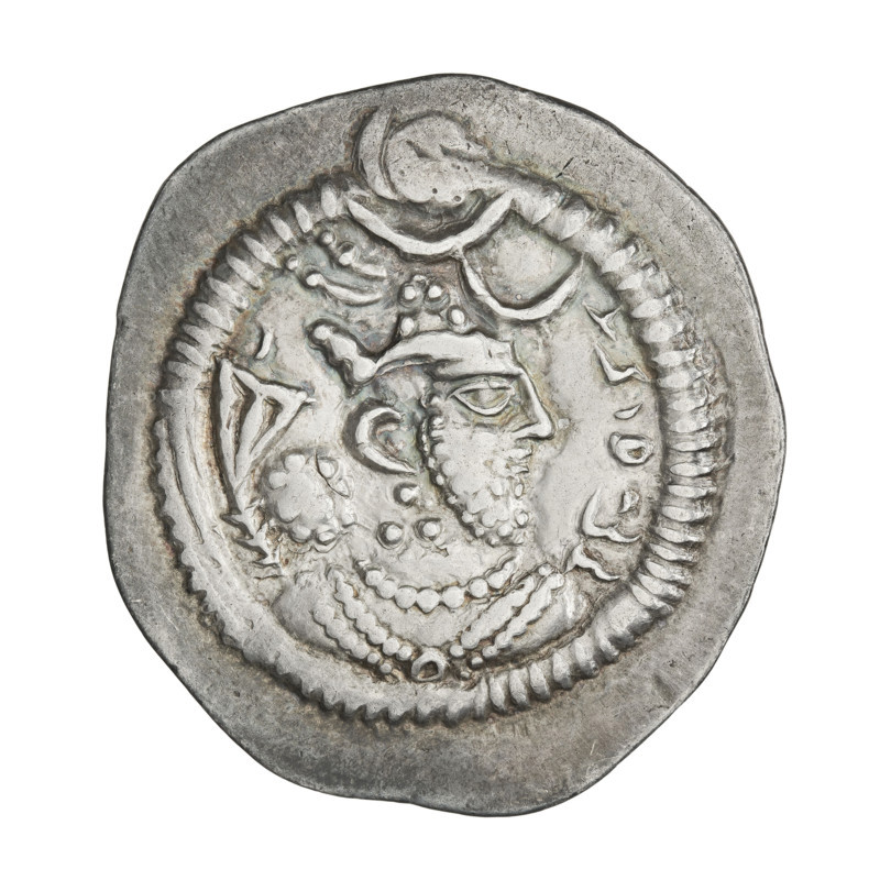 Drachma of Peroz I (ruler of Persia; 459–484). Obverse: bust of Peroz I facing right; wearing a crown with a crescent and korymbos, with a second crescent in front of the crown; Pahlavi legend. Reverse: fire altar; to its left the ruler stretching his hands to a star, to its right a priest stretching his hands to a crescent; signs/monograms on both sides; pearl border; Pahlavi legend. Sassanid art/style. Iran (Persia). 459–484 CE. Coin; diameter 25.5 × 28.0 mm; weight 4.10 g.