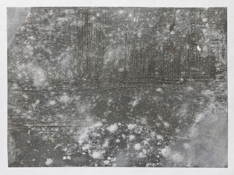 Street in the city; Feliks Jablczynski (1865–1928), graphic artist; cityscape of tenement houses and windows; architectural study; Polish graphic; ca. 1924, Warsaw; graphic matrix/plate; height 8 cm, width 10.8 cm, A textured rectangular surface fills the image, showing a weathered, rough appearance with a mix of gray shades and areas of lighter whitish patches. There are fine linear scratches and grid-like incisions across the upper half, forming vertical and horizontal patterns and suggesting raised ridges. The lower portion has irregular mottled spots and softer cloudy patches in white and pale gray against darker gray areas. Subtle variations include small darker brownish-gray streaks and faint beige flecks in places, with overall tones limited to various grays, whites, and hints of brownish-beige.