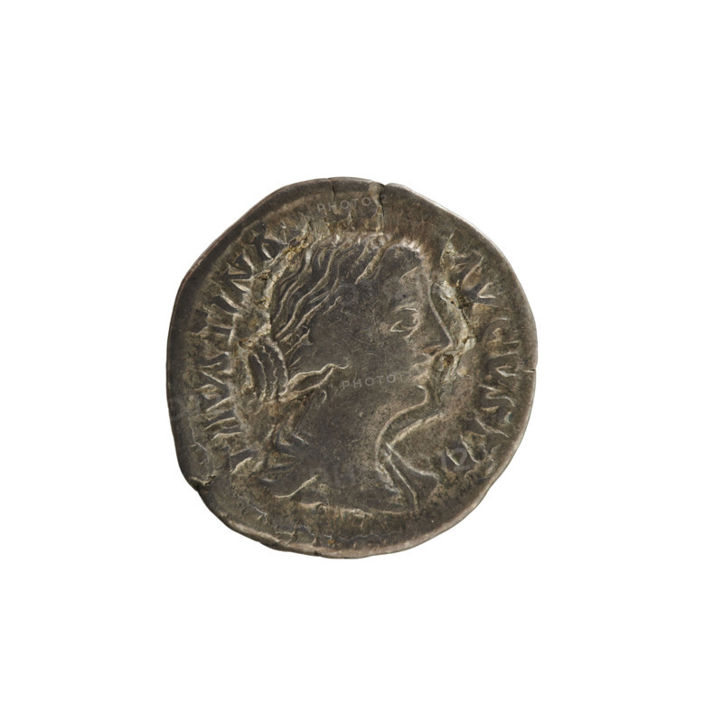 Denarius, Marcus Aurelius (121–180; Roman emperor 161–180) and Faustina the Younger (c.130–176; Roman empress 161–176). Obverse: bust of the empress right in drapery, hair arranged in waves and tied in a bun, pearl border. Legend: FAVSTINA AVGVSTA. Reverse: Ceres seated on a chest left, holding ears of corn in her right hand and a torch in her left; pearl border. Iconography: Ceres, ears of corn (attribute), torch (attribute). Date: 161–176. Roman Empire (27 BC–476). Rome. Coin (denarius). Weight: 3.05 g. Axis: 180°.