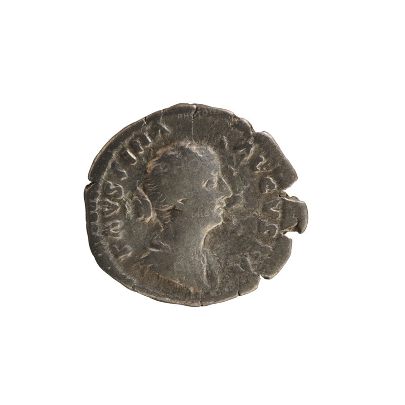 Denarius, Marcus Aurelius (121–180; Roman emperor 161–180) and Faustina the Younger (c.130–176; Roman empress 161–176). Busts; imperial numism. Obverse inscribed 'ADV. FAVSTINA AVGVSTA': bust of the empress right, draped, hair in waves tied in a bun, pearl border. Reverse inscribed 'DIANA LVCIF': Diana turned left holding a torch with both hands, pearl border. Date: 161–176. Roman Empire (27 BC–476). Rome. Coin; weight 3.07 g; axis 180°.