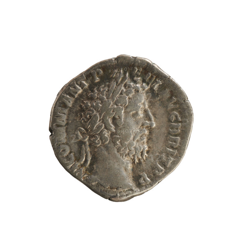 denarius, Commodus (161–192; Roman emperor 177–192). Obverse: M COMM ANT P FEL AVG BRIT PP — Emperor's head right, wearing a laurel wreath. Pearl border. Reverse: MART PAC PM TR P XIIII COS V DES VI — Naked Mars wearing a helmet and cloak, standing left; holds a branch in his right hand and a spear in his left. Roman, 189. Coin; weight 3.06 g; axis 135°.