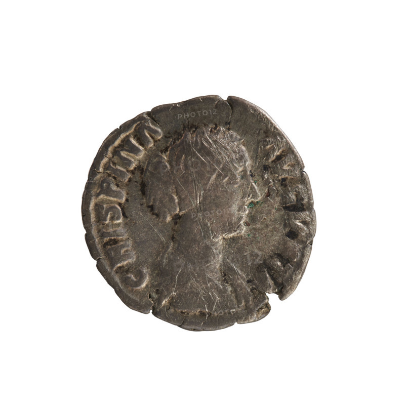 Denarius, Commodus (161–192), obverse: bust of Empress Crispina (164–192?) right, draped, hair in a bun, pearl border; inscription 'CRISPINA AVGVSTA'. Reverse: Juno standing left, holding a patera in her right hand and a scepter in her left, peacock in front; pearl border. Roman Empire, 178–191 CE. Coin; silver; weight 3.19 g; axis 180°.