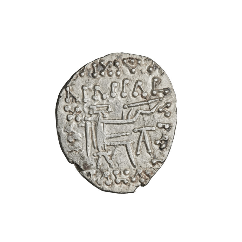 drachma, Vologases V (191-208); Obv.: head of Vologases V in tiara, king facing left; Rev.: Arsakes seated on a throne, bow in hand, facing right, below the arch – monogram; 191-208; Parthia, Ecbatana, Iran; coin; weight 3.90 g; helmets, heads, bows (armed)