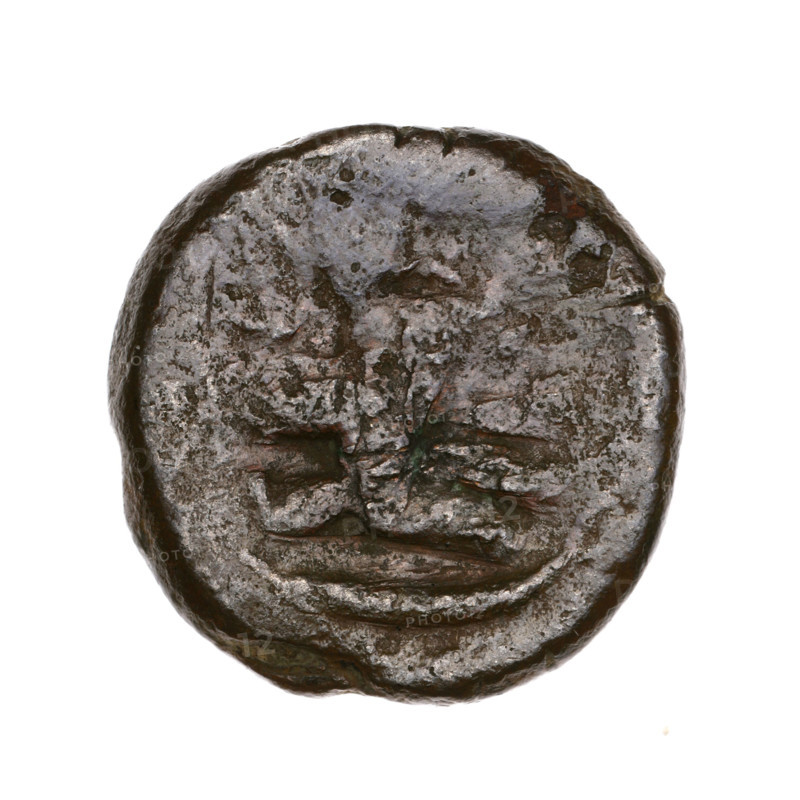 Bronze coin, Pantikapaion; obverse: head of a beardless Satyr in an ivy wreath facing left, with a twelve-pointed star countermark on it; reverse: lion's head with open mouth facing left, sturgeon below facing left, letters on the sides and top, countermark on the head (arch in the quiver). Iconography: Satyr, lion, sturgeon, bow in quiver/gorytos, quiver, twelve-pointed star, stars, fish, weapons/armament. Beginning of the 3rd century BC, Cimmerian Bosporus (Pantikapaion). Weight 6.32 g; axis 330°; diameters 21.4–21.6 mm.