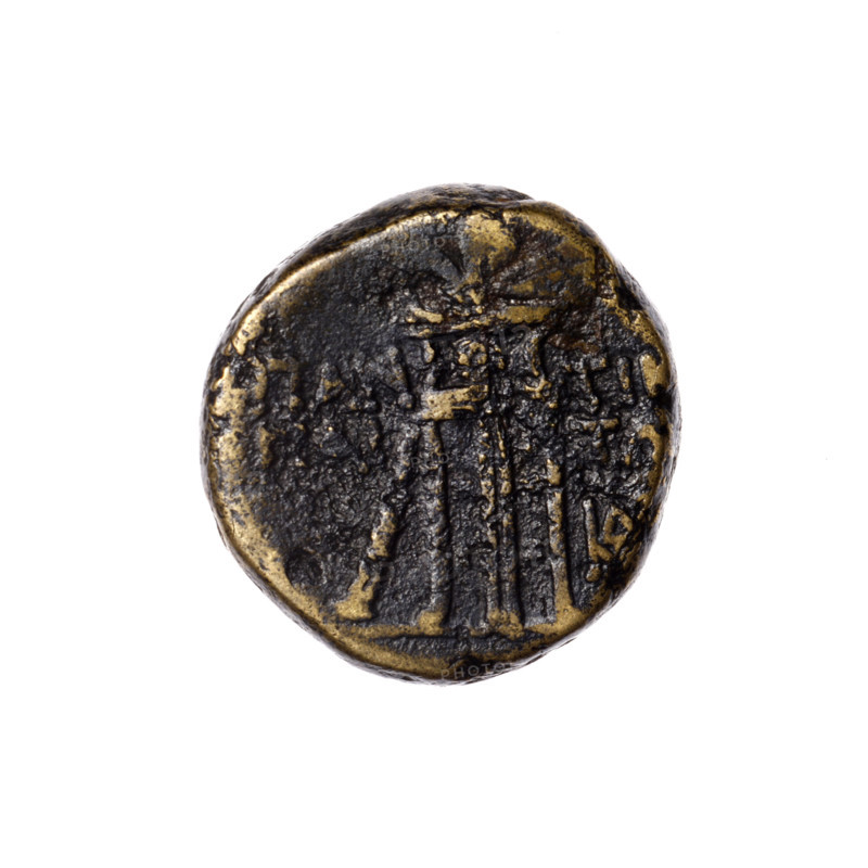 bronze coin, Pantikapaion; obverse: head of Apollo in a laurel wreath facing right; reverse: tripod, behind it a thyrsus with ribbons diagonally to the right, a monogram at right, inscription in two rows on the sides; iconographic elements: head of Apollo, thyrsus, tripod, monograms; mythology: Apollo; 1st quarter of the 1st century BC (95–65 BC); region: Cimmerian Bosporus (Pantikapaion); coin; weight 8.67 g; diameters 18.5 mm and 19 mm