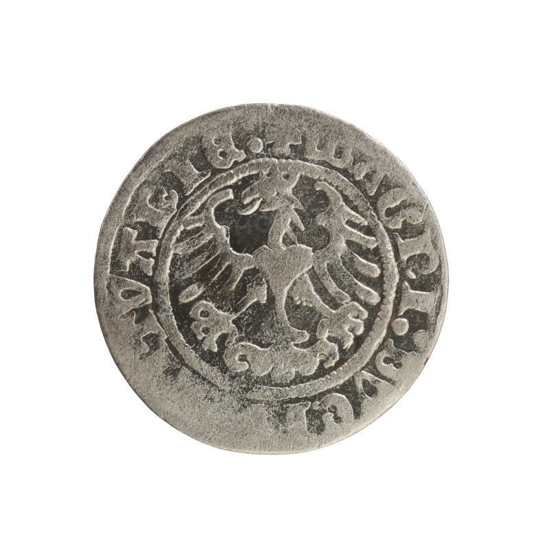 Lithuanian half-grosz, Sigismund I the Old (King of Poland; 1506–1548). Obverse: Pogon (Lithuanian charging knight) turned left; in the rim between pearl-shaped borders an inscription: TA: MVNDI:1.:. Rev.: Polish crowned eagle; in the rim between pearl-shaped borders an inscription: GNI:DVC, TVANIE:. Dated 1508–1529. Polish–Lithuanian coin (half-grosz), Jagiellon dynasty; emblems: Pogon and eagle. Materials/medium: coin. Place: Vilnius, Grand Duchy of Lithuania, Poland.