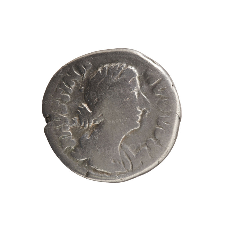 Denarius, Faustina the Younger (ca. 130–176; Roman empress 161–176), Marcus Aurelius (121–180; Roman emperor 161–180) (issuer). Bust of Faustina II in drapery facing right, legend 'FAVSTINA • AVGVSTA' around. Reverse: Juno in a veil standing left, holding a patera in her right hand and a long scepter in her left, a peacock at her feet on the left; circumferential legend 'I·V·NO'. Iconography: Juno, scepters, peacocks, patera. Date: 161–176 CE, Roman Empire (27 BC–476). Coin: Rome; denarius; diameter 18.0 mm; weight 3.31 g; axis 0°.