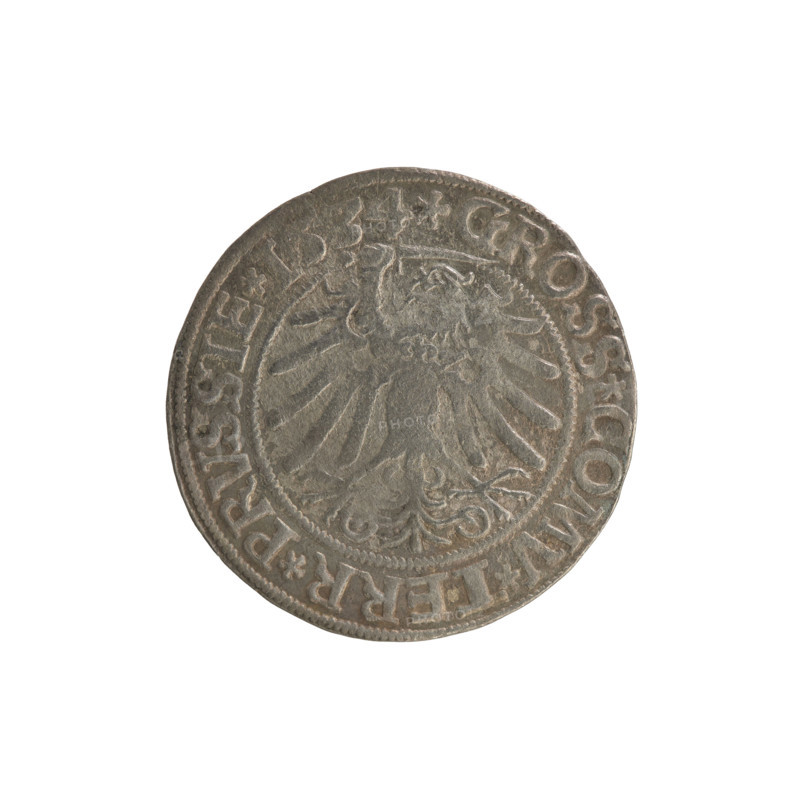Prussian grosz, Sigismund I the Old (King of Poland; 1506–1548). Silver coin (grosz), 1534, Torun, Poland. Obverse: Crowned male bust in profile turned to the right; in the rim between pearl borders the inscription: .SIGIS.I.REX.PO.DO.TOCI.PRVSSIE. Reverse: The Eagle of Royal Prussia; in the rim between the pearl borders the inscription: .GROSS.COMV.TERR.PRVSSIE. Subjects/themes: Polish coins; Jagiellonian dynasty; coats of arms; eagles; royal/male bust; iconography of Sigismund I the Old.