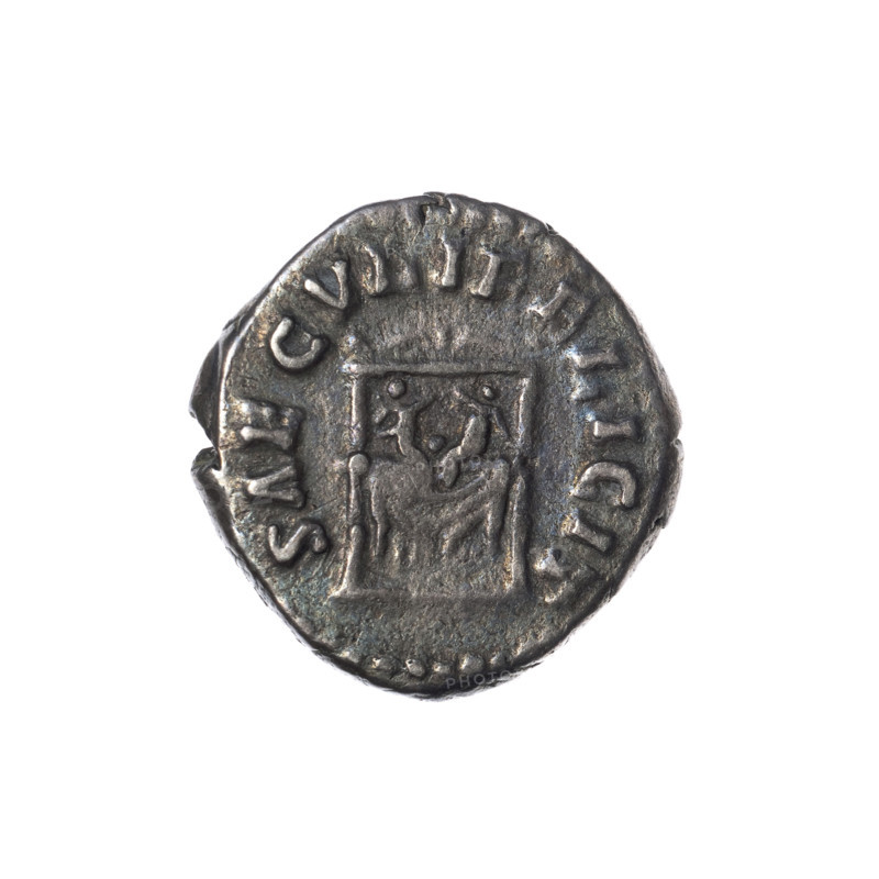 Denarius of Faustina the Younger (ca. 130–176; Roman empress 161–176) issued under Marcus Aurelius (121–180; Roman emperor 161–180). Obverse: draped bust of Faustina II facing right, inscription FAVSTINA·AVGVSTA. Reverse: draped throne (pulvinar) on which two children—twins Commodus and Antoninus—are seated, inscription SAECVLI·FELICIT. Date: 161–176. Roman Empire, Rome. Coin; silver; weight 3.28 g; diameter ~17.5–18.0 mm; axis 180°.