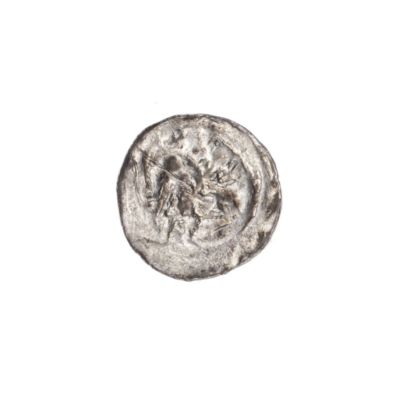 Denarius of Boleslaw III Krzywousty (prince of Poland, ca. 1086–1138). Obverse: in a linear border, a knight in chain mail thrusting a spearhead into the jaws of an upside-down dragon (allegory of the fight between good and evil / fight against pagans; motifs: knight, chain mail, spear, jaws, dragons, martyrs, Romanesque style; possible reference to St. Adalbert). Reverse: in a triple beaded border, an isosceles cross topped with balls; between its arms, a sun. Date ca. 1125–1138. Poland, Kraków. Coin; diameter 12.9–13.2 mm; weight 0.32 g. Makers/attributions: Boleslaw III Krzywousty.