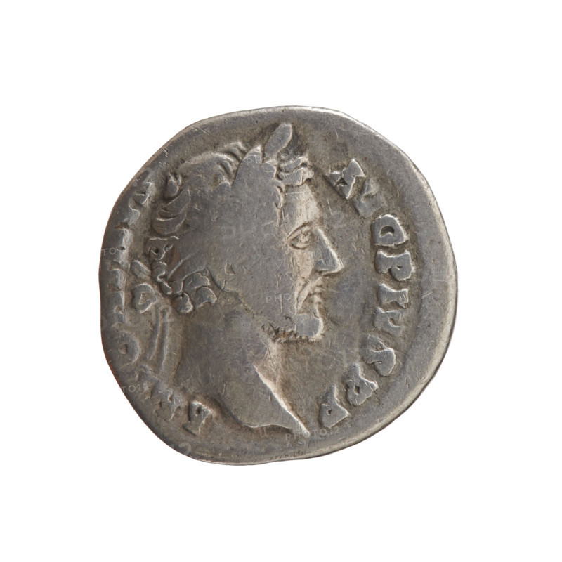 Denarius, Antoninus Pius (86–161; Roman emperor 138–161) (issuer); personifications; Antoninus Pius — iconography; scepters; paterae; Concordia (personification). Obverse: Head of Antoninus Pius in a laurel wreath facing right, inscription ANTONIN – AVG PIVS PP all around. Reverse: Concordia standing left, holding a patera in her outstretched right hand and a long scepter in her left, inscription C O – S – IIII all around. Date: 145–161. Place: Rome, Roman Empire. Coin; diameter 17.5–18.5 mm; weight 2.60 g; axis 180 degrees.