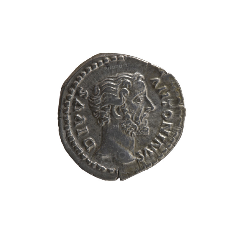 Denarius; issuers: Marcus Aurelius (121–180, Roman emperor 161–180) and Lucius Verus (130–169, Roman emperor 161–169); posthumous for Antoninus Pius (86–161, Roman emperor 138–161). Obverse: head of Antoninus Pius without a covering, facing right, inscription 'DIVVS ANTONINVS' (circumferential). Reverse: eagle standing right, head turned left, inscription 'CONSECRATIO' (circumferential). Iconography: animals, eagle; date: after 161; place: Rome, Roman Empire. Coin: diameter 16.5–17.0 mm, weight 3.45 g, axis 180°.