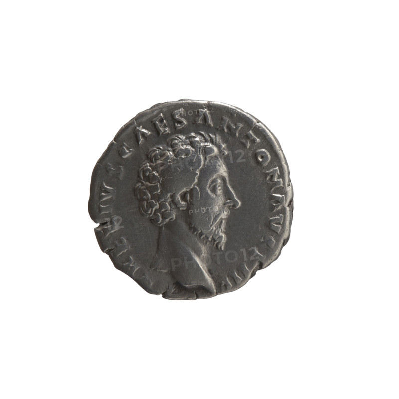 Denarius, Marcus Aurelius (121–180; Roman emperor 161–180), (caesar 139–161); issuer: Antoninus Pius (86–161; Roman emperor 138–161). Obverse: Head of Marcus Aurelius without a cap to the right, inscription VRELIVS CAES ANTON AVG PII F circumferential. Reverse: Felicitas standing left, holding a caduceus in his right hand and a scepter in his left, inscription TR POT X–II–COS II circumferential. Iconography: caducei, scepters, Felicitas (personification); personifications, columns. Date: 157–158. Place: Rome, Roman Empire (27 BC–476). Coin. Diameter: 16.0–16.5 mm. Weight: 3.07 g. Axis: 195°.