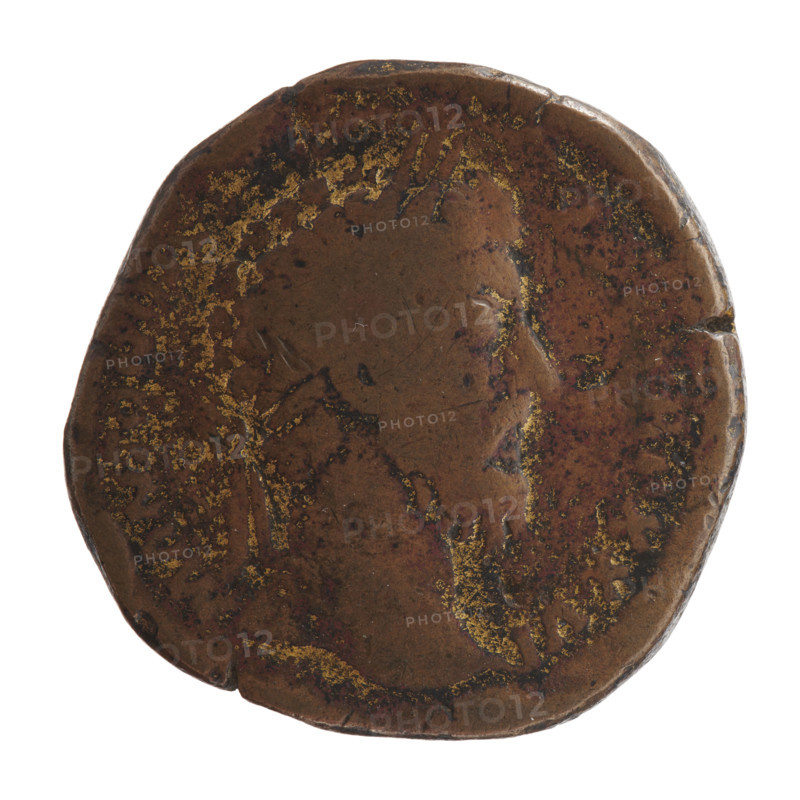 Sestertius of Marcus Aurelius (121–180; Roman emperor 161–180), issuer: Marcus Aurelius. Obverse: head of Marcus Aurelius with laurel wreath facing right, legend M ANTONIN, RP XXVI. Reverse: Roma personified sitting on armor facing left, holding a scepter in her right hand and resting her left on a stack of shields, legend IMP VI -, field marks S-, date 171–172. Roman Empire (27 BC–476), Rome. Coin; diameter 32.5 mm, weight 27.10 g, axis 180 degrees.