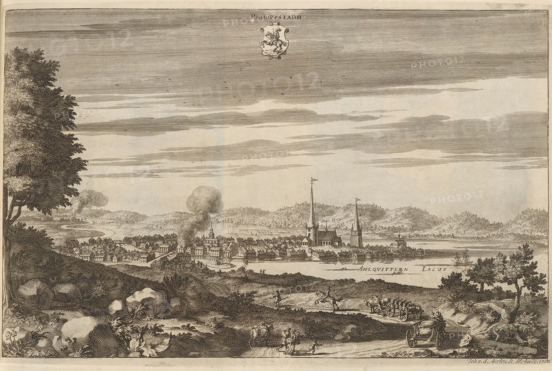 Philippstadh, View of Filipstad, Suecia Antiqua et Hodierna, print, album page, printmaker: Johannes Jacobsz van den Aveele, Stockholm, supervision: Erik Jönssen Dahlberg, 1702, paper, etching, height 245 mm x width 381 mm, city-view in general, 'veduta', Filipstad, A wide etched landscape shows a town by a body of water with clusters of buildings and several tall church spires rising above the rooftops; smoke rises from a chimney within the town and small boats are visible on the water near the shore. In the foreground a gently sloping, rocky hillside with scattered trees, bushes, and large stones leads down to a dirt path where small groups of people walk and converse; a cart drawn by a horse travels along the path while another horse-drawn vehicle with a seated figure moves toward the viewer. Trees frame the left and right edges of the scene, and distant hills form the backdrop under a sky filled with long, horizontal cloud bands.
