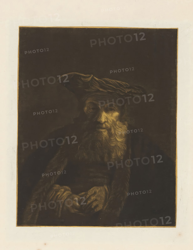Old man with long beard and flat hat, print, album page, stamp, printmaker: William Baillie, after painting by Rembrandt van Rijn, 1753 - 1810, paper, paste, etching, mezzotint, etching and mezzotint, printed on yellow prepared paper, pasted onto album page, height 242 mm x width 194 mm, old man, A dark, rectangular portrait set against a pale background shows an older man with a long beard and deep-set eyes wearing a loose, draped head covering and a heavy fur-trimmed cloak, his hands folded in front of him and dim highlights tracing the contours of his face, beard, clothing, and the textured fabric of the head covering.
