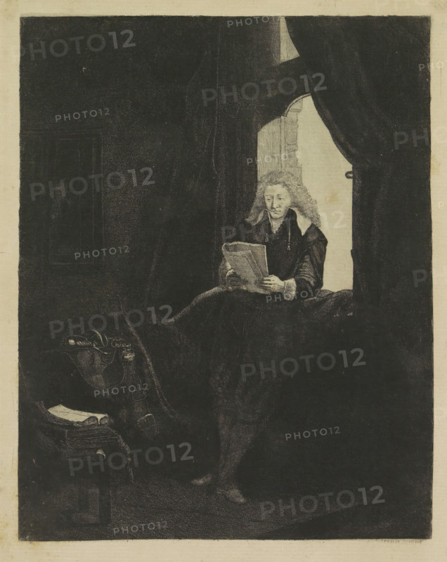 Jan Six, Collection of eighty-five original prints, print, album page, printmaker: Pierre François Basan, after print by Rembrandt van Rijn, publisher: Henry Louis Basan, Paris, 1750 - 1797, 1807 - 1808, Rembrandt van Rijn, after print by, paper, etching, etching pasted on album page, height 285 mm x width 205 mm, Person, A dimly lit interior dominated by deep shadow with a lighter alcove on the right where a seated figure is visible, the figure has long curly hair and a high white collar and is holding an open folded sheet, the face has a calm expression and the hands rest on the paper, heavy drapery frames the alcove and falls in dark folds, a chair with a curved back sits in the foreground on the left with a book or papers laid on it, the floor and surrounding space are rendered in dark tones with subtle texture and crosshatching.