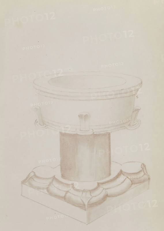 Photo reproduction of the drawn baptismal font of the church of Leur, photograph, reproduction, page, photographer: Benjamin Charlé (possibly), after drawing by anonymous, c. 1903 - in or before 1908, paper, pasteboard, baryta paper, daylight collodion silver print, height 150 mm x width 195 mm, baptismal font, Leur, A pale pencil drawing of a pedestal-like structure centered on a light background, showing a cylindrical column rising from a square base with rounded, scalloped decorative elements; the column supports a shallow, circular bowl or dish with a wide rim and small hooked fixtures around its circumference, rendered with soft shading and subtle contours.