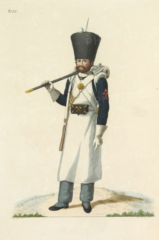 Sappeur, of the National Infantry, print, A Dutch sapper of the National Infantry, with the axe on his shoulder. Plate 15. Uniform representation in 'Description of the Royal Dutch Troops' by JF Teupken, 1823., printmaker: Dirk Sluyter, Netherlands, after drawing by Bartholomeus Johannes van Hove, publisher: Jan Frederik Teupken, publisher: Gebroeders van Cleef, printer (person): Giunta d'Albani, Gebroeders, The Hague, 1823, Dirk Sluyter, Bartholomeus Johannes van Hove, Jan Frederik Teupken, Gebroeders van Cleef, Giunta d'Albani, printer (person), paper, etching, engraving, hand coloring, etching and engraving, hand colored, height 300 mm x width 205 mm, (military) uniforms, uniform, infantry, Period, 1820 - 1823, A full-length colored illustration of a standing man in a historical military uniform set against a pale, mostly empty background, wearing a tall, dark fur hat topped with a small round pompon and a slender spike, a dark blue coat with long sleeves and a red emblem on one sle...