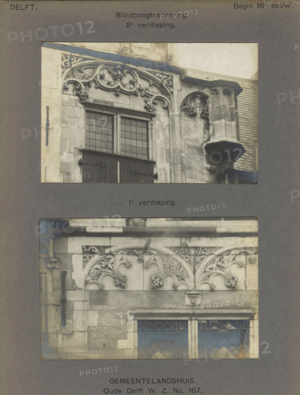 Windows of the Gemeenlandshuis on the Oude Delft in Delft decorated with arches and leaf motifs, Gemeentelandshuis. Oude Delft WZ No. 167. Blind arch tracery 2nd floor. 1st floor, photograph, number: '18', inscription: 'Delft. Early 16th century.', inscription: 'The right of reproduction of these photos is reserved by the Publisher.', Delft, c. 1900 - c. 1904, photographer, paper, pasteboard, gelatin silver print, height 224 mm x width 166 mm, ornament derived from plant forms, closed window, Gemeenlandshuis, A faded photographic collage shows two framed images of a stone building façade mounted on a textured gray background. The upper image displays an ornate arched stone window with a decorative carved tympanum above leaded glass panes and a projecting small stone balcony or corbel to the right; visible masonry blocks and a shuttered lower section appear beneath the window. The lower image shows another section of the same façade with a carved ornamental arch pattern above rectangula...
