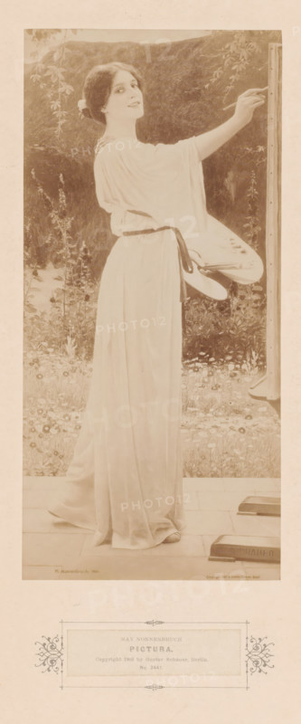 Reproduction of painting 'Pictura' (1901) by Max Nonnenbruch (1857-1922), photograph, Reproduction of painting 'Pictura' (1901) by Max Nonnenbruch (1857-1922)., caption: 'Deposited by GUSTAV SCHAUER, Kunstverlag, Berlin, Louis Wolff & Co., London W. 245 Tottenham Court Road., FISHEL, ADLER & SCHWARTZ, New York, 373 Fifth Avenue.', check stamp: 'G. Schauer', inscription: 'M. Nonnenbruch.1901. Copyright by ? Gustav Schauer Berlin', label: 'MAX NONNENBRUCH, PICTURA., COPYRIGHT 1902 BY GUSTAV SCHAUER, BERLIN, No. 2441', photographer: Gustav Schauer, after painting by Max Nonnenbruch, 1902, pasteboard, paper, albumen print, albumendruk, height 249 mm x width 116 mm, height 485 mm x width 375 mm, A full-length portrait of a woman standing outdoors in a long flowing light-colored gown, shown in profile with her head turned slightly toward the viewer and a faint smile on her face, her dark hair pinned back with a flower. She holds a palette and brushes at her side and reaches up with one arm t...
