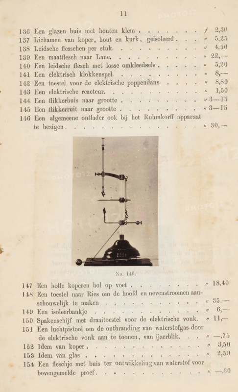 Unloader, photograph, page, number: 'No. 146.', photographer: Fredrich Wilhelm Funckler, Netherlands, c. 1857 - in or before 1867, paper, albumen print, height 66 mm x width 44 mm, Photo on page 11., physics (tools, instruments, laboratory equipment, scientific research), A sepia-toned page showing a vertically oriented rectangular photograph of a metal apparatus centered on the lower half, with a round base and a vertical rod supporting multiple horizontal and angled arms, clamps, and small decorative knobs; the photograph has a light background with faint speckles. The page surrounding the photograph has evenly spaced lines of printed text in a serif font, with dotted leader lines and columns of marks aligned to the right, and a small centered caption below the photograph. The paper shows age with light brown stains and small darker spots near the edges, and faint discoloration along the margins.