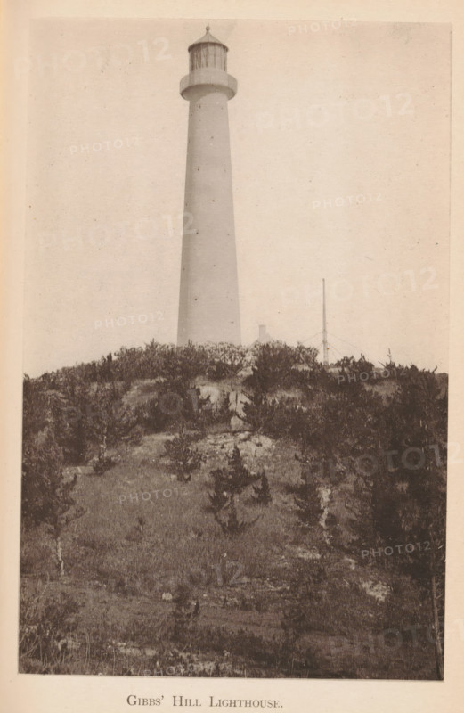 Gibbs' Hill Lighthouse, page, photomechanical print, photographer: James H. Stark, Bermuda, cliché maker: Photo-Electrotype Company, Boston (Massachusetts), c. 1879 - in or before 1884, James H. Stark, Photo-Electrotype Company, photographer, cliché maker, North America, Massachusetts, paper, collotype, photoprint, height 151 mm x width 90 mm, lighthouse, lightship, Gibbs Hill Lighthouse, A tall cylindrical lighthouse rises from behind a sand dune covered in low, scrubby vegetation, its smooth shaft tapering slightly toward a lantern room with vertical window panels and a domed roof; in front of the lighthouse the dune slopes down with scattered grasses and small bushes, and a thin pole with supporting guy wires stands near the base of the tower.