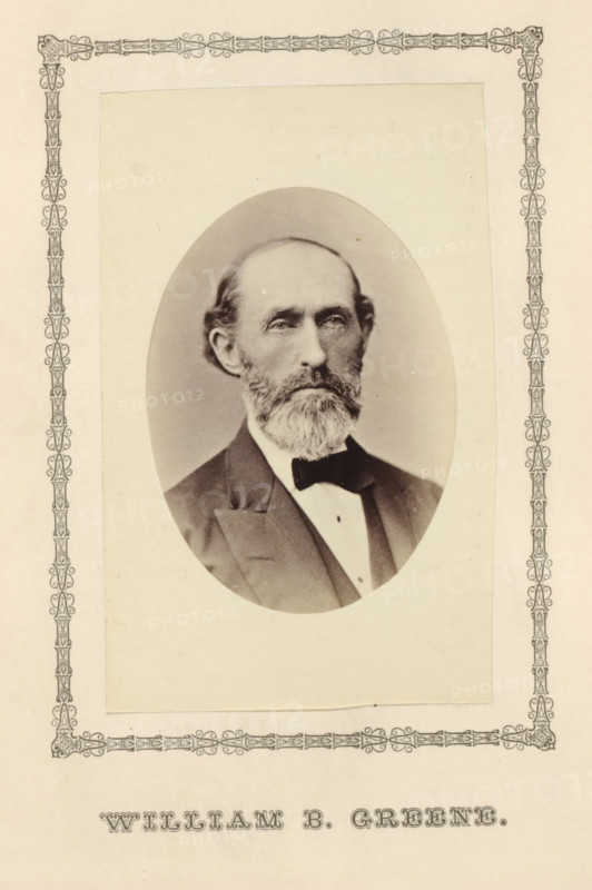 William B. Greene, photograph, page, c. 1876 - in or before 1881, photographer, paper, albumen print, height 99 mm x width 60 mm, adult man, A sepia-toned oval portrait of an older man with a receding hairline, full beard, and mustache, wearing a dark suit jacket, white shirt, and bow tie, mounted on a rectangular light-colored background with an ornate decorative border surrounding the portrait area.