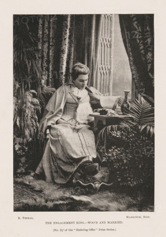 Portrait of an unknown woman at a window, The Engagement Ring. - Woo'd and Married, page, photomechanical print, inscription: '(No. 11f of the 'Enticing Offer' Prize Series.)', photographer: R. Terras, cliché maker: Harry Clary Jones, c. 1887 - in or before 1892-09-17, R. Terras, Harry Clary Jones, photographer, cliché maker, paper, autotypie, height 157 mm x width 112 mm, Print fifteen of fifteen prints between page viii and page 545., historical persons not known by name - BB - woman, sitting figure, window-seat, A monochrome image of a seated woman wearing a long dress and a shawl, looking down toward her lap while holding a small object, surrounded by draped curtains and potted plants, with a table nearby that holds a vase and other small items, and a patterned rug and fur on the floor beneath her.