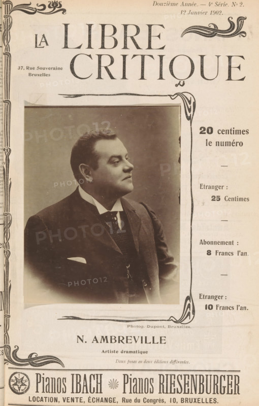 N. Ambreville, Portrait of Nicolas d'Ambreville, page, photomechanical print, photographer: Dupont, Brussels, cliché maker: anonymous, c. 1897 - in or before 1902, Dupont, photographer, cliché maker, paper, collotype, photoprint, height 127 mm x width 99 mm, Person, Nicolas d' Ambreville, portrait of actor, actress, A sepia-toned photograph of a man in a formal dark suit with a white shirt and tie, shown in profile facing right, set within an ornate rectangular frame on a printed page that features decorative borders and flourishes; the man has short dark hair, a rounded face, and a pocket square visible in his jacket, and the surrounding page shows printed layout elements and ornamental corner designs.