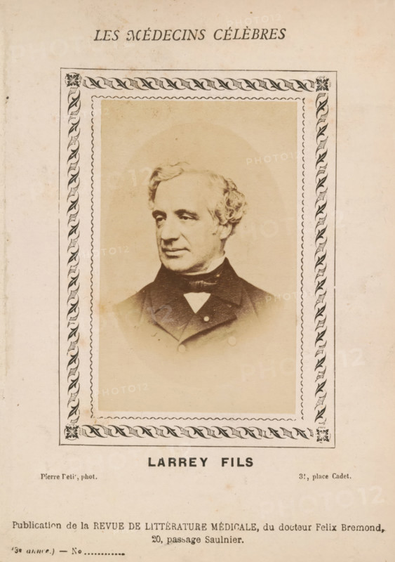 Larrey Fils, Portrait of Félix Hippolyte Larrey, photograph, page, inscription: '(Publication de la Revue de literature médicale, du docteur Félix Bremond, 20, Passage Saulnier, Paris., 3e année - No.', photographer: Pierre Petit, c. 1871 - c. 1879, paper, albumen print, height 81 mm x width 54 mm, Person, Félix Hyppolyte Larrey, historical persons, adult man, A sepia portrait of a middle-aged man with wavy hair and sideburns shown from the chest up, wearing a dark coat with a high collar and a bow tie, centered within an ornate rectangular frame with a repeating leaf-like border and corner floral motifs, all set on an aged, light-colored paper background.