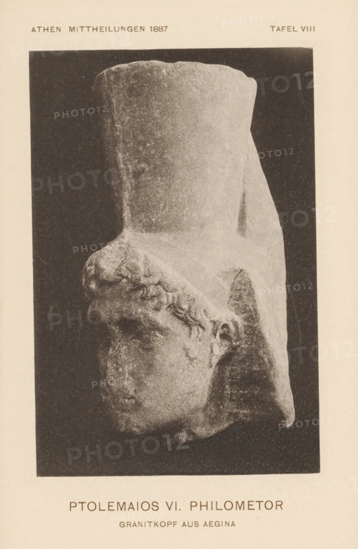 Granite head of Ptolemy VI Philometor from Aegina, Ptolemy VI. Philometor - Ganitkopf aus Aegina, page, photomechanical print, inscription: 'Athen Mittheilungen 1887 Tafel VIII', c. 1881 - in or before 1886, paper, collotype, photoprint, height 158 mm x width 110 mm, Print four pages after page 211., Person, Ptolemy VI Philometor (pharaoh of Egypt), sculpture, head (human), A sepia-toned photograph of a worn stone sculpture showing a side view of a human head and a tall cylindrical headdress, with visible textured stone surfaces and carved hair along the temple and ear, set against a dark rectangular background and surrounded by a lighter border.