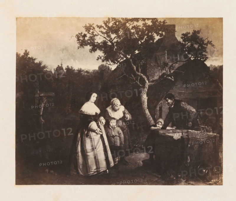 Photo reproduction of La visite de la ferme by Joseph Lies, photograph, reproduction, page, after painting by Joseph Lies, c. 1858 - in or before 1863, photographer, paper, albumen print, albumendruk, height 116 mm x width 144 mm, historical persons, picture, painting, housing, A faded monochrome scene shows a group of people gathered outdoors in front of a large tree and a stone structure, with leafy branches extending across the upper area and a cloudy sky behind them. A woman in a long dress with a light-colored bodice stands to the left, holding a folded item at her waist. A child in a coat stands near her feet, looking forward. An older woman with a head covering leans slightly forward and gestures toward a seated figure at a stone basin, whose head rests on folded arms on the basin edge. A man in simple clothing bends toward the seated figure from the right side, one hand on the basin and the other near his hip. Dark foliage and stonework form the background and lower foreground,...